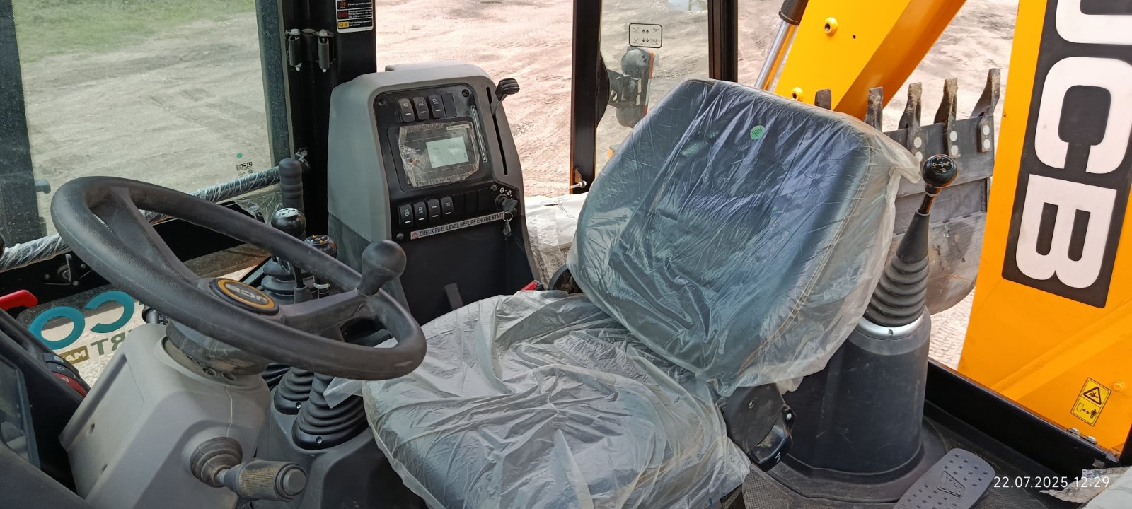 Экскаватор-погрузчик JCB 3DX - фото 1