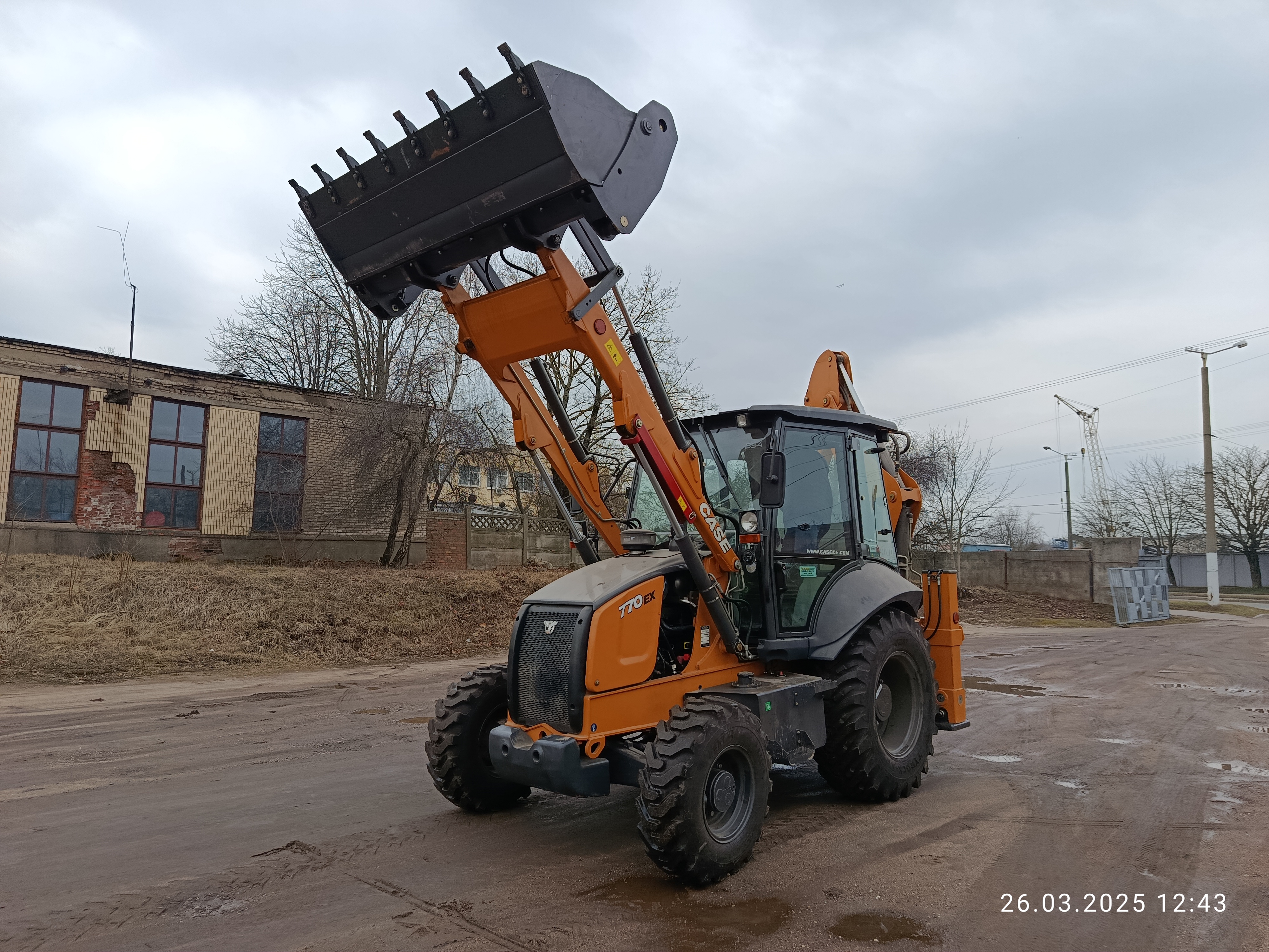 Экскаватор-погрузчик Case 770EX - фото 3