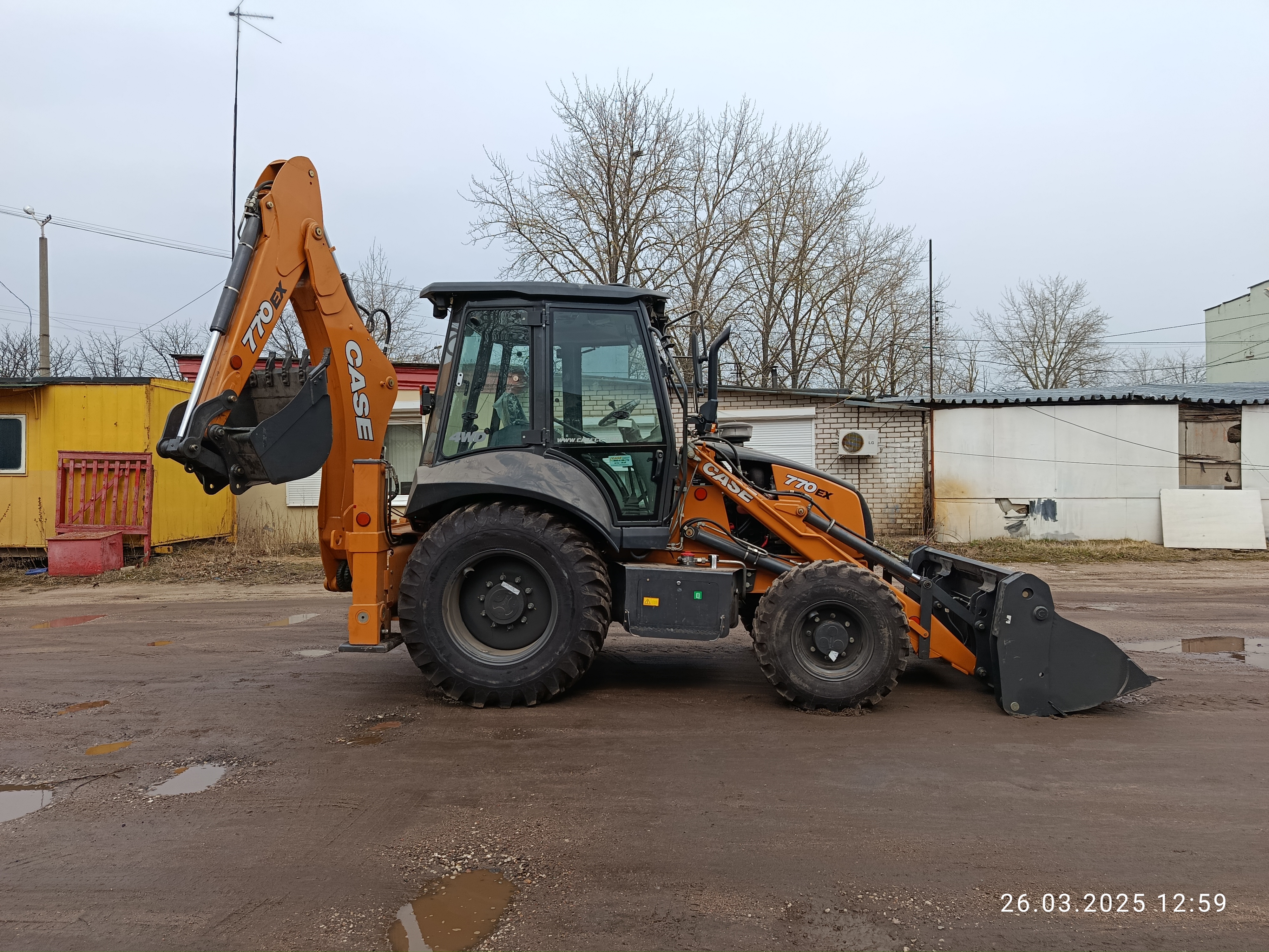 Экскаватор-погрузчик Case 770EX - фото 2