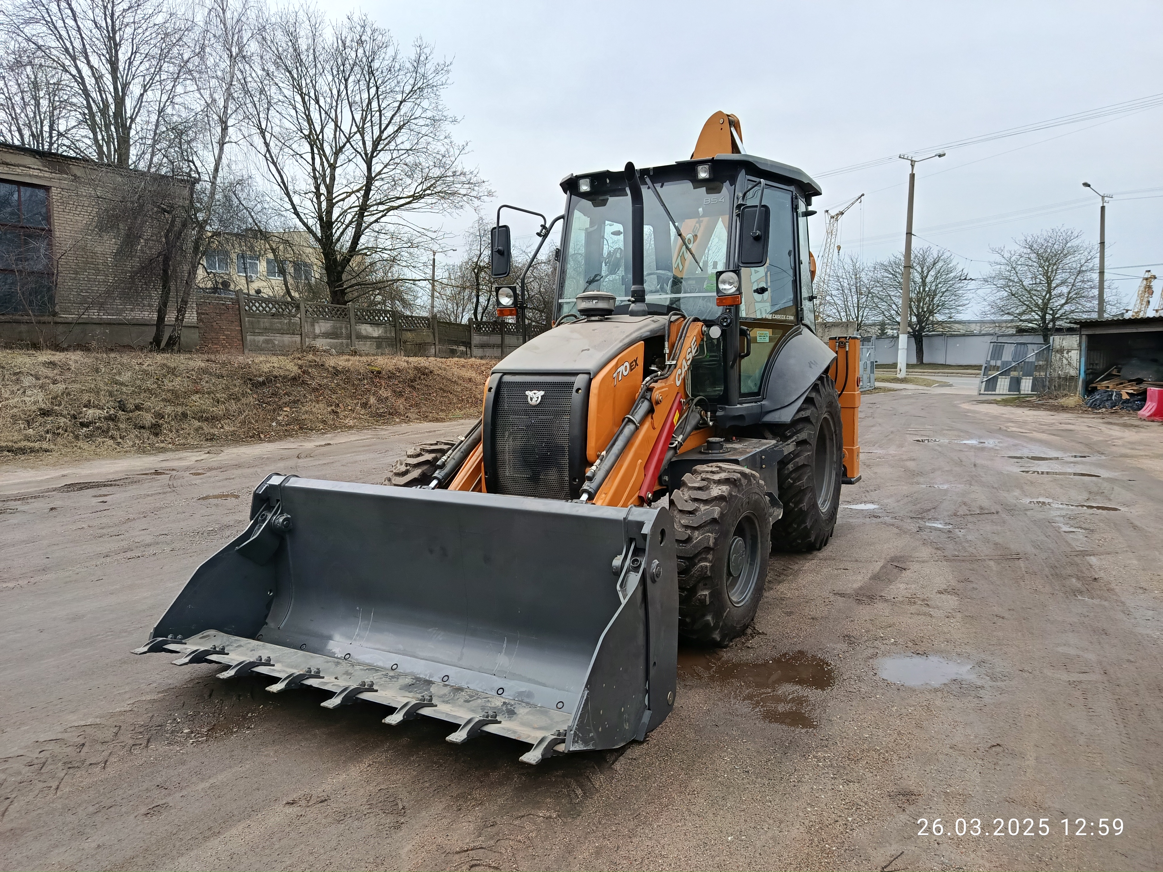 Экскаватор-погрузчик Case 770EX - фото 4